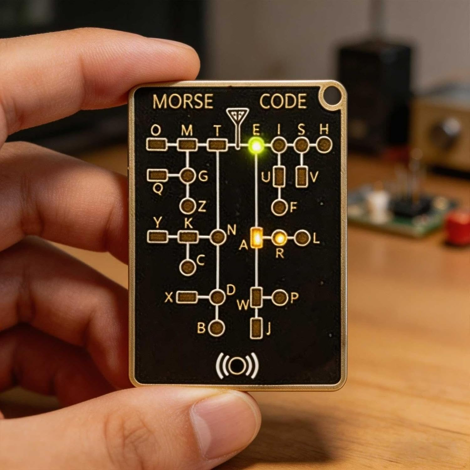 Compact Morse code practice trainer with LED signal mode and alphabet reference chart